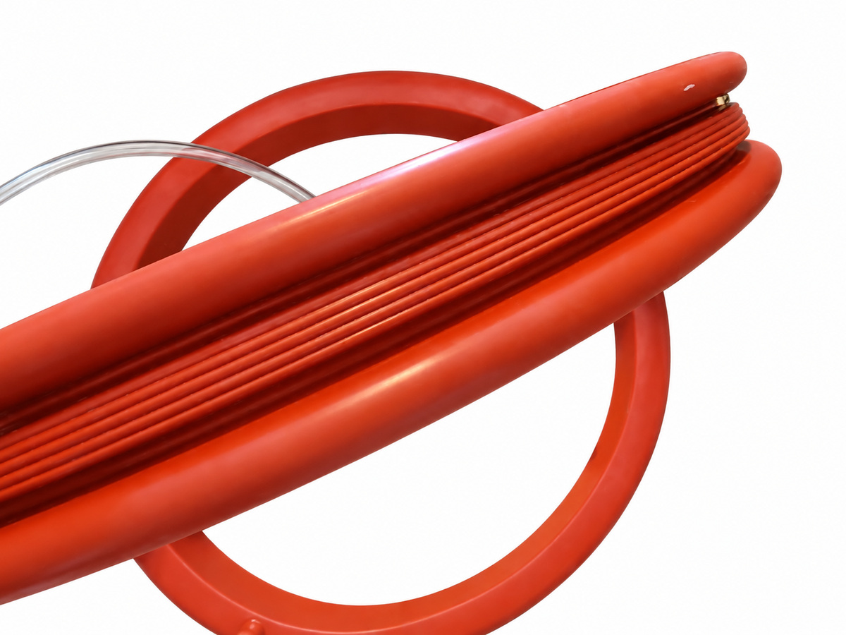 Close-up of red sealing profile and clear tubing — Battery Dry Room Airlock Inflatable Seal
