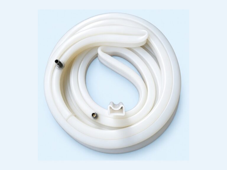 Coiled white sealing profile with metal fittings — Cold Chain Storage Door Inflatable Seal