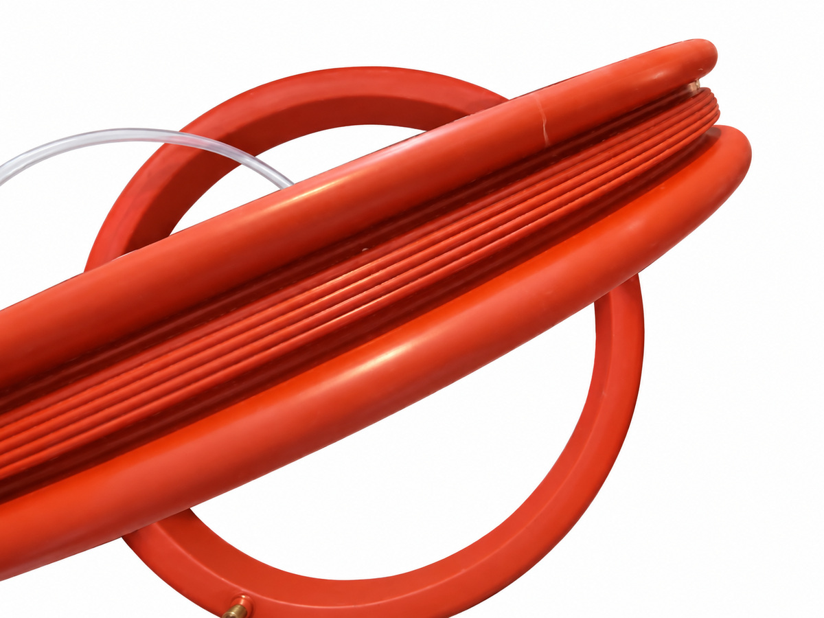 Close-up of red sealing profile with clear tube — Wafer Fabrication Chamber Inflatable Seal