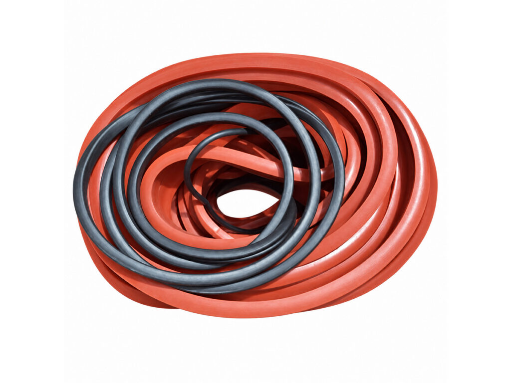 Coiled red and black sealing profiles — Wind Tunnel Hatch Inflatable Seal