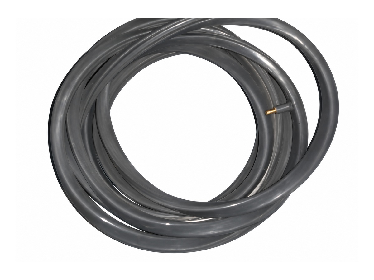 Coiled gray sealing profile with small brass fitting — Yacht Door Inflatable Rubber Seal