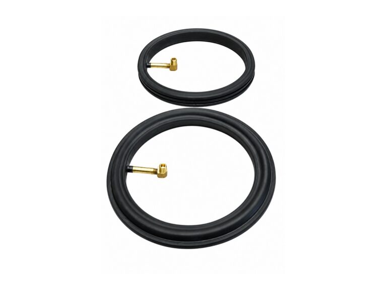 Two black circular seals with brass air fittings — Bulk Solids Feeder Inflatable Seal