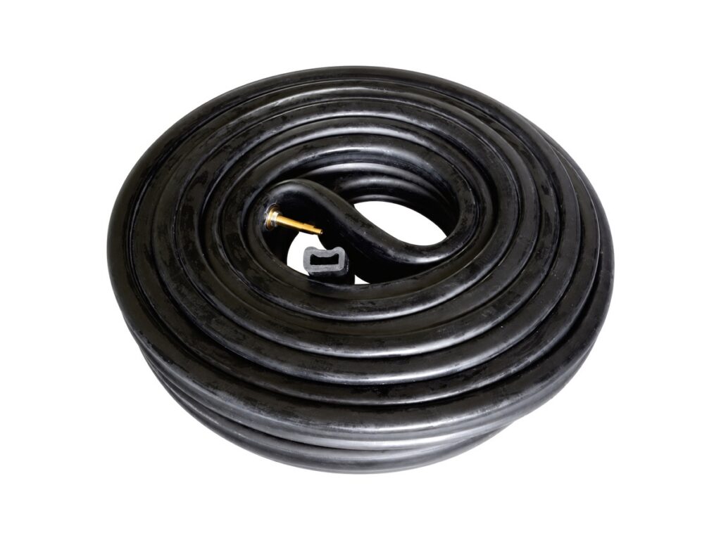 Black coiled sealing profile with brass fitting — Rail Vehicle Door Inflatable Seal