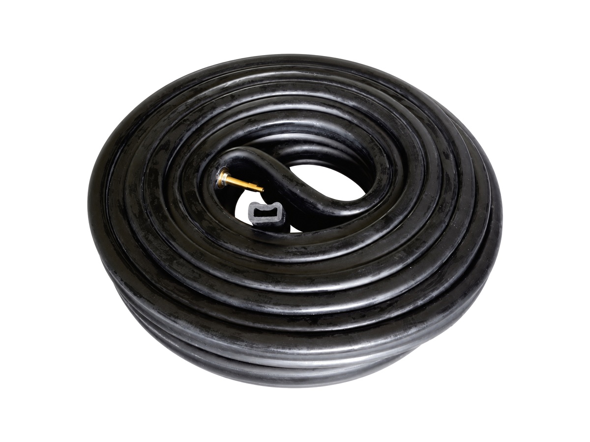 Black coiled sealing profile with brass fitting — Rail Vehicle Door Inflatable Seal